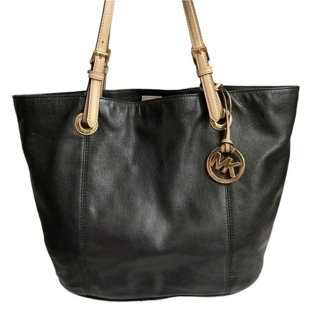 Michael Kors soft black leather tote bag with gold logo hangtag
